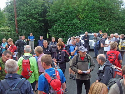 Walkers mingle before the briefing