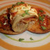 Arrollado de berenjena y jamón crudo gratinado