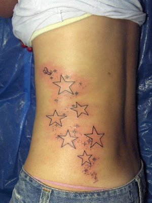 tattoo on girls ribs. tattoo star rib sexy girls