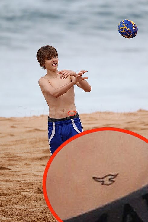 Justin Bieber Hip Tattoo. Pint sized super star Justin Bieber has been 