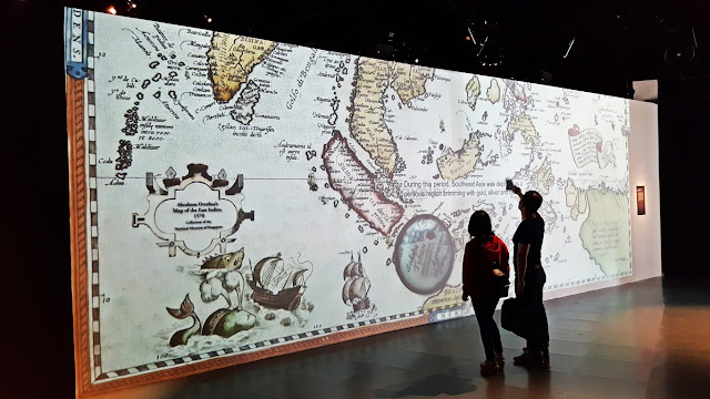 gigantic projection screen at the entrance of the National Museum of Singapore