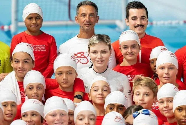 Princess Charlene attended a drowning prevention workshop held for the participants of the Saint Devote Rugby Tournament