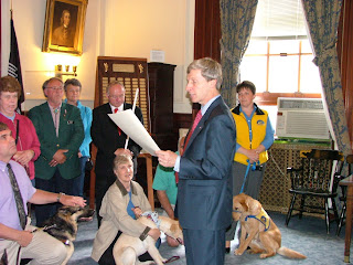 PHOTO OF GOVERNOR LYNCH READING THE SERVICE ANIMAL AWARENESS DAY PROCLAMATION