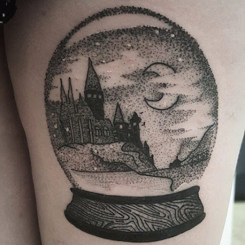 Keep Your Memories Encased In These Glinting Snow Globe Tattoos