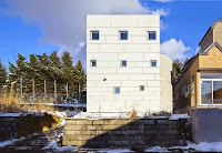 Hokkaido Vertical White House Design with More Loft and Platforms