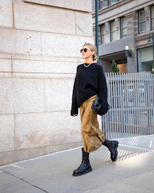 How to Wear a Satin Skirt for Fall Outfit Idea Stepsofstyle – Black Sweater, Bottega Veneta Clutch Bag, Black Lug Sole Boots 