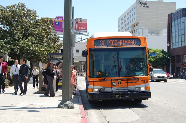 Bus Picking People Up on a Los Angeles Street Corner