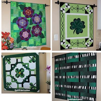 four green themed wall hangings