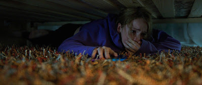 Talitha Eliana Bateman thinks she's safe under the bed in COUNTDOWN.