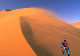 Spiderman Comic Super Heroe standing tall Wallpapers in Classic Desert Wind background
