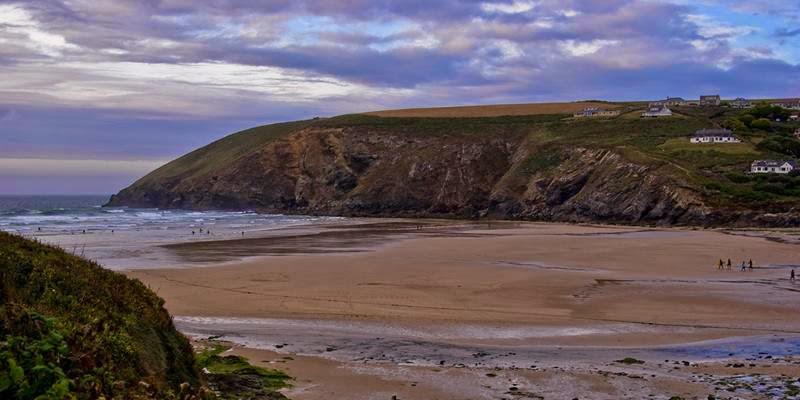 Mawgan Porth means cove of the Gluvian river,  a beach and small settlement in north Cornwall, England. Located in mid way between Padstow and Newquay on the rugged north Cornish coast, on the Atlantic Ocean coast. The picturesque village is positioned at the seawards end of the Vale of Lanherne. 