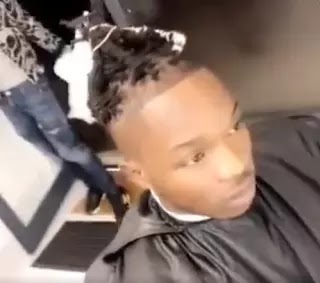 Naira Marley Spotted Cutting His Hair After His Bail