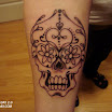 Latest girl skull tattoos