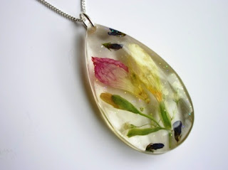 Wedding flowers preserved within jewellery