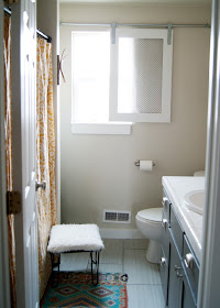 Bathroom Makeover - before & after - World Market rug / mat and vintage hairpin leg stool and DIY barn door window covering