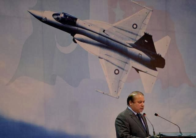 Pakistan's Prime Minister Nawaz Sharif speaks during a Dec. 18 ceremony at the Pakistan Aeronautical Complex in Kamra. Pakistan launched production of a new version of a combat aircraft featuring upgraded avionics and weapons system. The plane, to be called Block-II JF-17, will be manufactured at the Pakistan Aeronautical Complex west of Islamabad, which has so far produced 50 older-model Block-I JF-17s for the air force. (Aamir Qureshi / Getty Images)