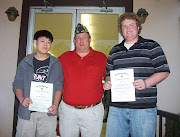 D.J. Hawkins (left) and Logan Wolfe (right) display certificates they . (nr americanism)