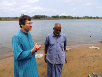 Tony doing ministerial work at Godavri River with Joy