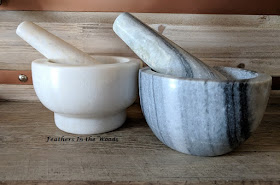 Marble and granite mortar and pestle sets.