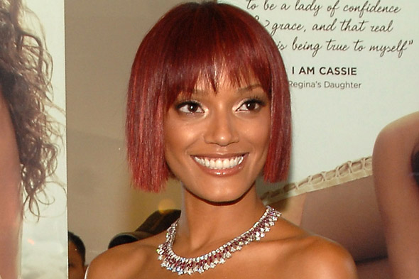 rihanna long red hair with bangs. Rihanna chooses Red Hot Red as
