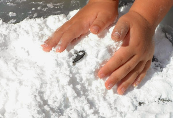 Forget play dough- wow the kids with GHOST FOAM instead!  This ghostly dough is so icy cold it just might give you chills! #ghost #ghostdrawing #ghostfoam #ghostfoamrecipe #ghostfoamcraft #ghostcraftsforkids #ghostcrafts #ghostrecipes #ghostartprojectsforkids #ghostmud #ghostplaydough #halloweenactivities #halloweenartsandcraftsforkids #growingajeweledrose #activitiesforkids