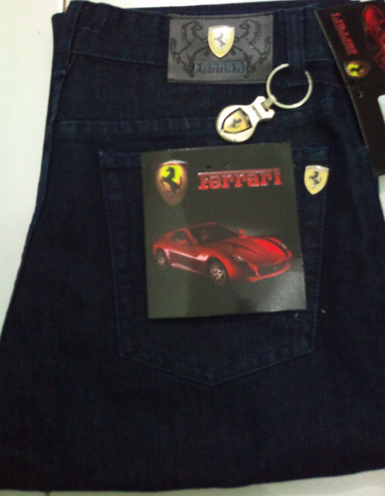  grosir  baju  branded  celana jeans ferrari