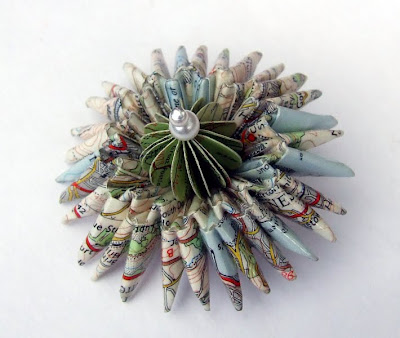 refolded map brooch