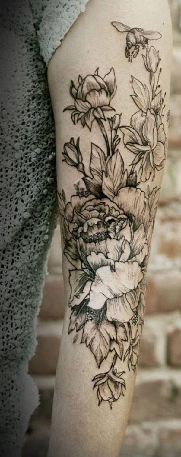 Awesome black lines flowers tattoo on arm