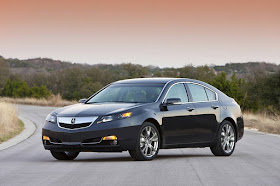 Front 3/4 view of 2012 Acura TL on road