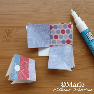 Arranging paper tiles