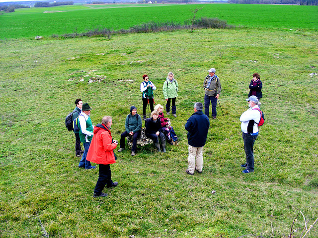 Walking group resting at a lime kiln.  Indre et Loire, France. Photographed by Susan Walter. Tour the Loire Valley with a classic car and a private guide.