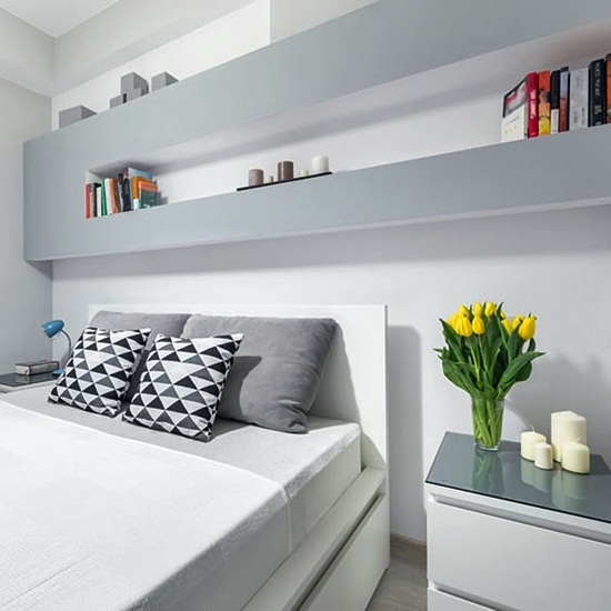 grey and white bedroom design with shelves