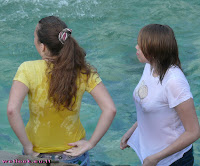 Wetlook. Teen. Two girls in a fountain.