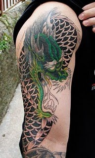 Dragon Tattoo Designs,dragon tattoos,dragon tattoos designs,tattoos designs,dragon pictures,dragon tattoo design,dragon pics,chinese dragon tattoo,dragon images,dragon art,dragon tattoo for women,dragon tattoo for men