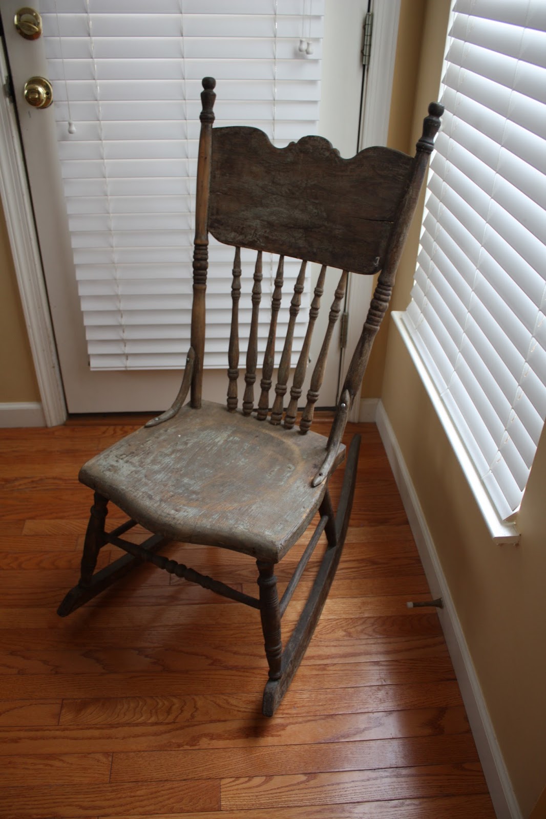 Antique Pressed Back Rocking Chair