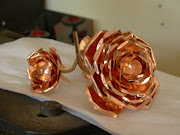 Copper roses above and other pretty and useful copper items below made and .
