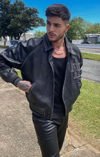 Sexy Dude With Scruffy Beard Wearing A Black Leather Jacket