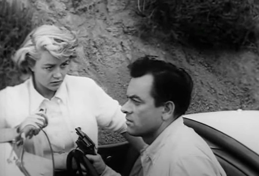 Webster (John Ireland) pulls a gun on Connie (Dorothy Malone), The Fast and the Furious, 1954