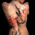 Gorgeous Women Back Tattoos Designs