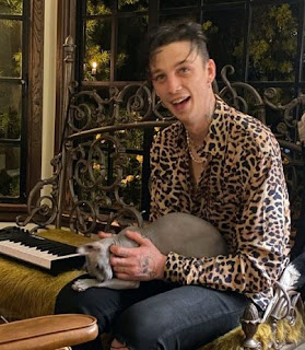 Picture of Ash Stymest with the cat