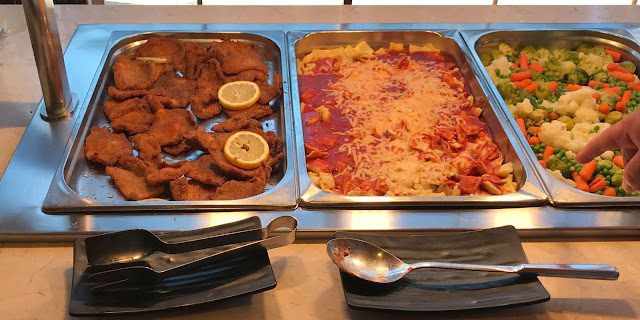 pasta, veg and breaded pork on buffet at Pirates village evening meal