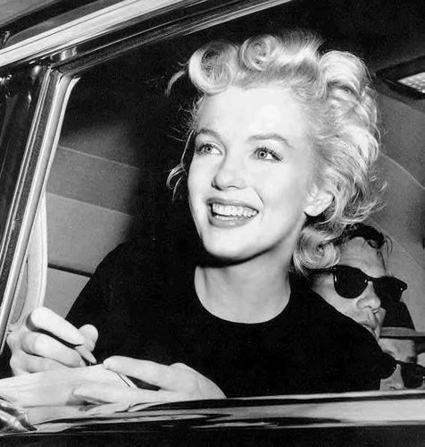 Marilyn favored classic colors like black white red and beige