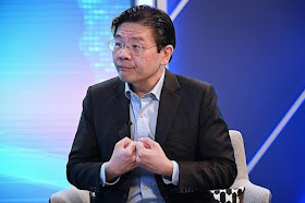 Mr Lawrence Wong said the curbs will give Singapore time to build up its healthcare capacity.