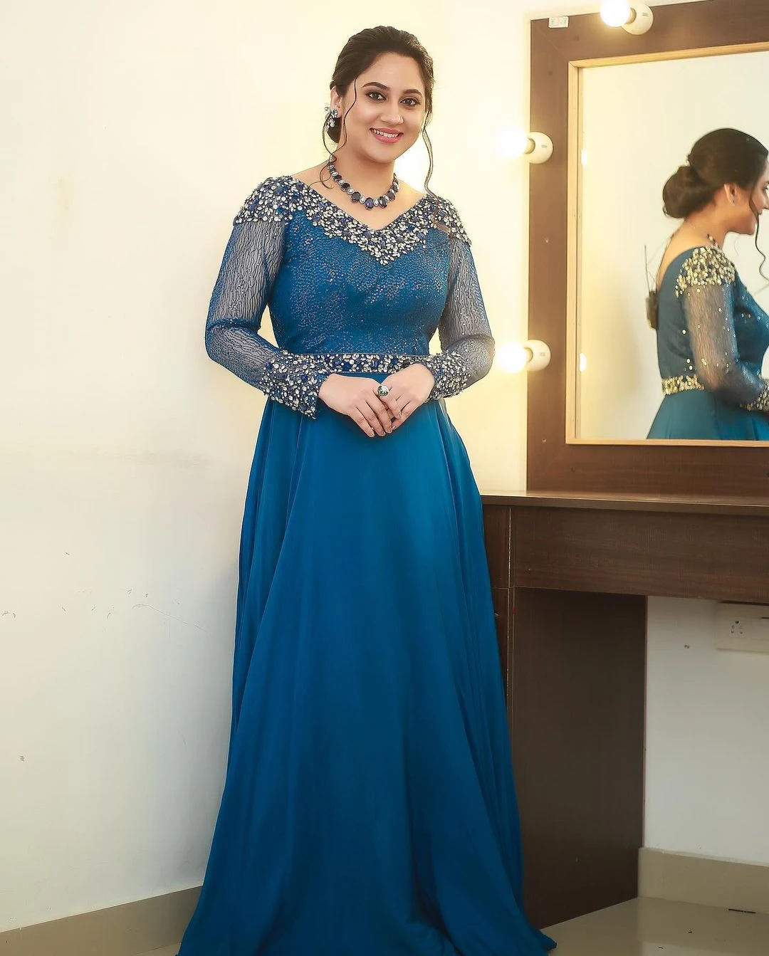 Malayalam Beauty Miya George in blue gown Photoshoot