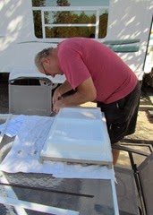1309109 Sep 25 Terry Works On Fridge Door Seal