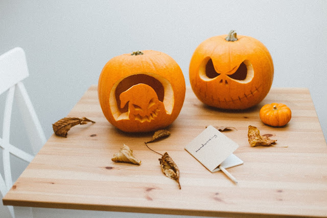 carved pumpkins on table