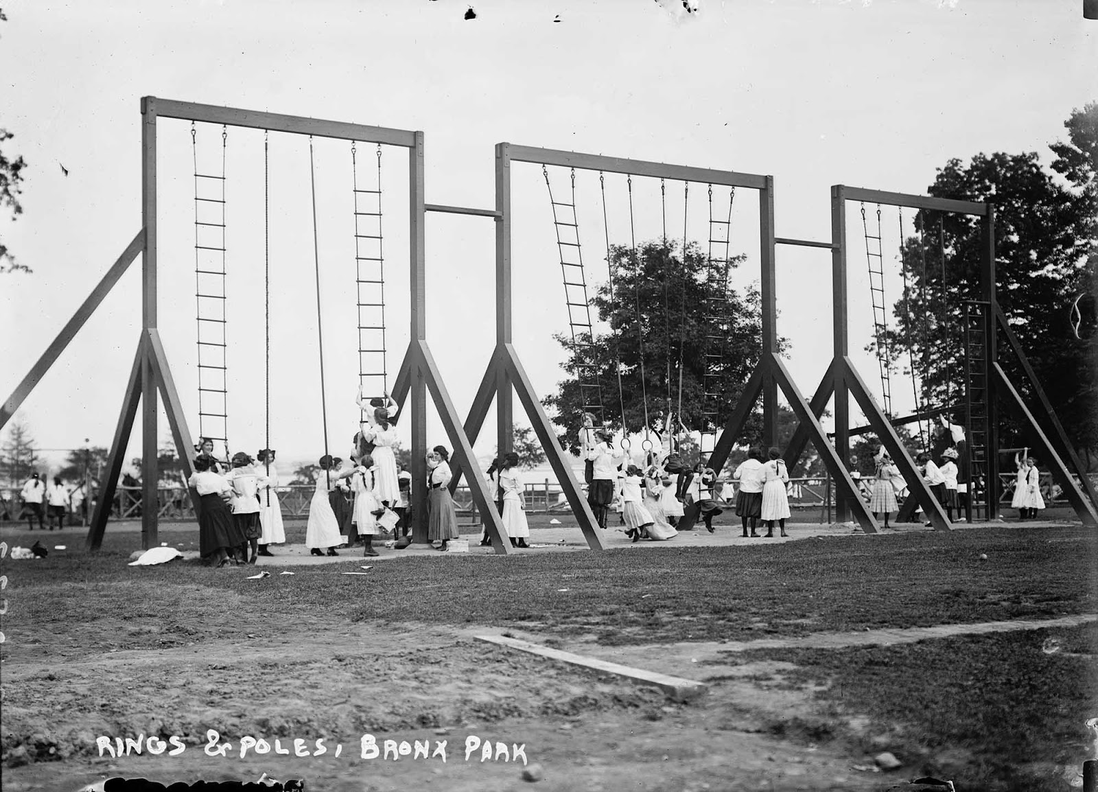 Rings and poles, Bronx Park, New York. 1911.