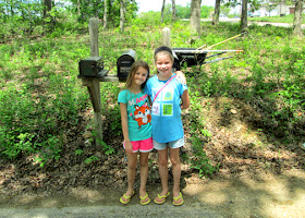 Tessa and her neighbor friend posed for a quick pic before setting to work on their iris bulb garden.