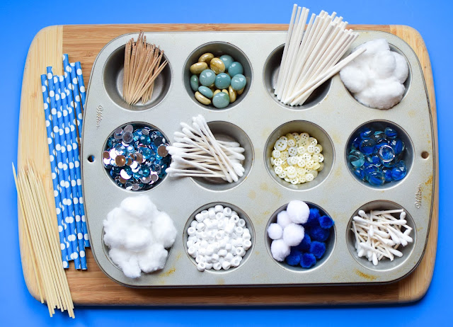 Winter STEM- Build A Snowflake Tinker Tray.  Use loose parts to build snowflakes.  Explore radial symmetry as you incorporate math, science, fine motor work, and creativity in this activity for preschoolers, kindergartners, and elementary kids.