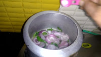 Add in onions, chillies and curry leaves. Saute till the onions start turning brown.